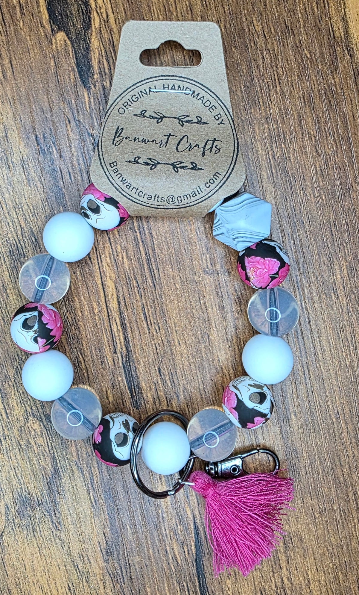 Pink skull, white & clear wristlet