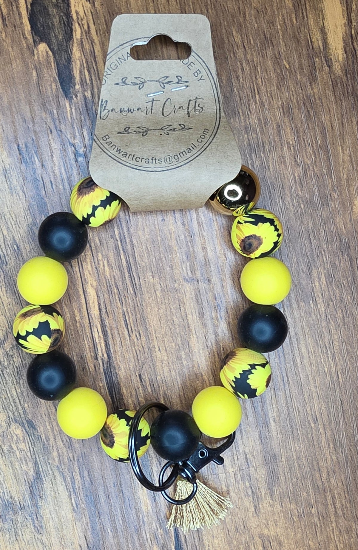Sunflower, black & yellow wristlet