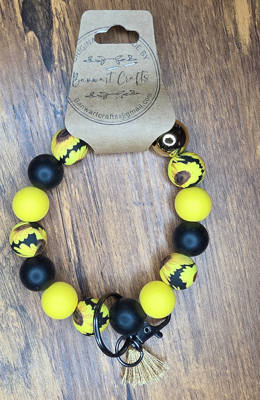 Sunflower, black & yellow wristlet