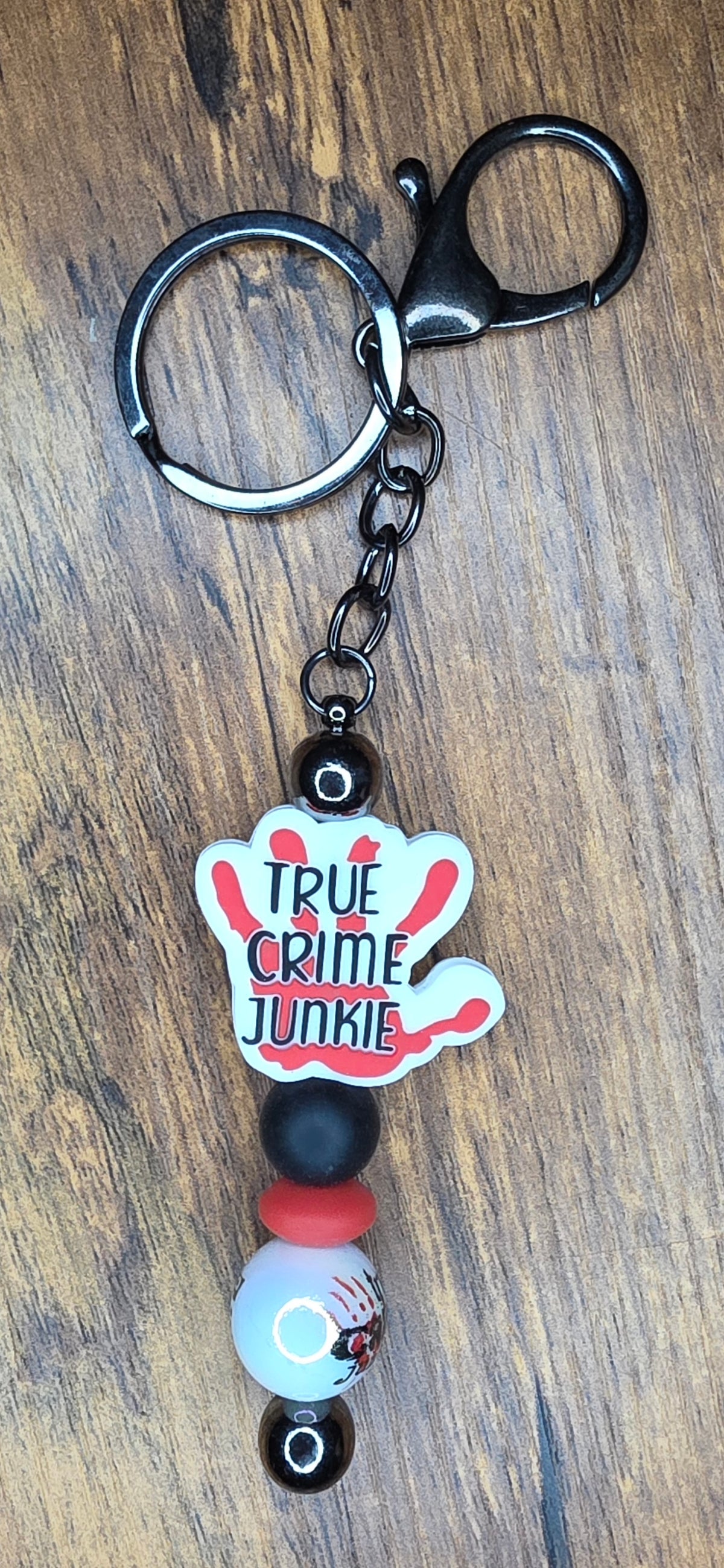 True crime bar keychain