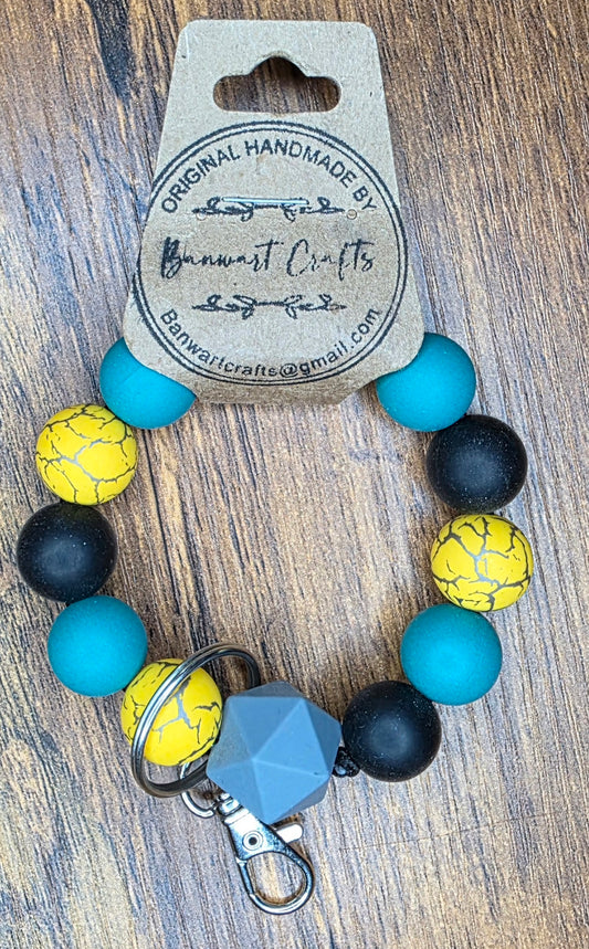 Yellow crackle, blue & black wristlet