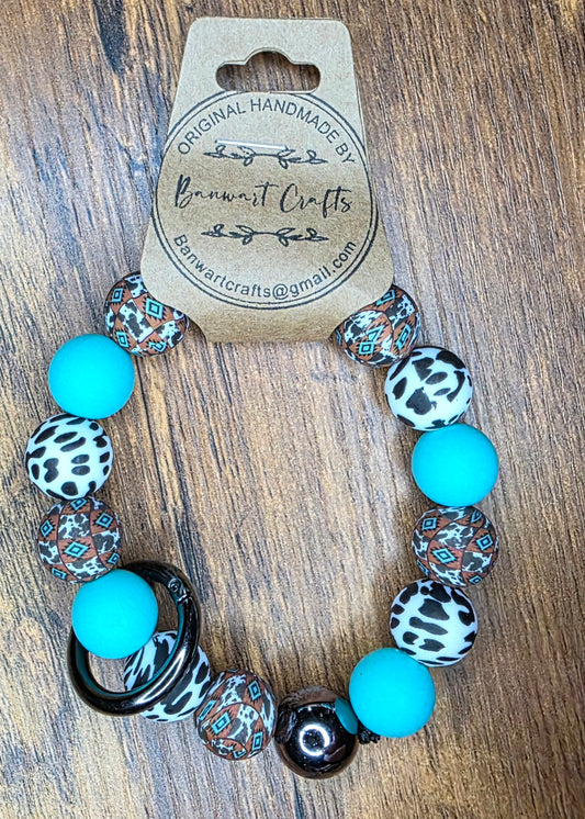 Turquoise & Cow Wristlet