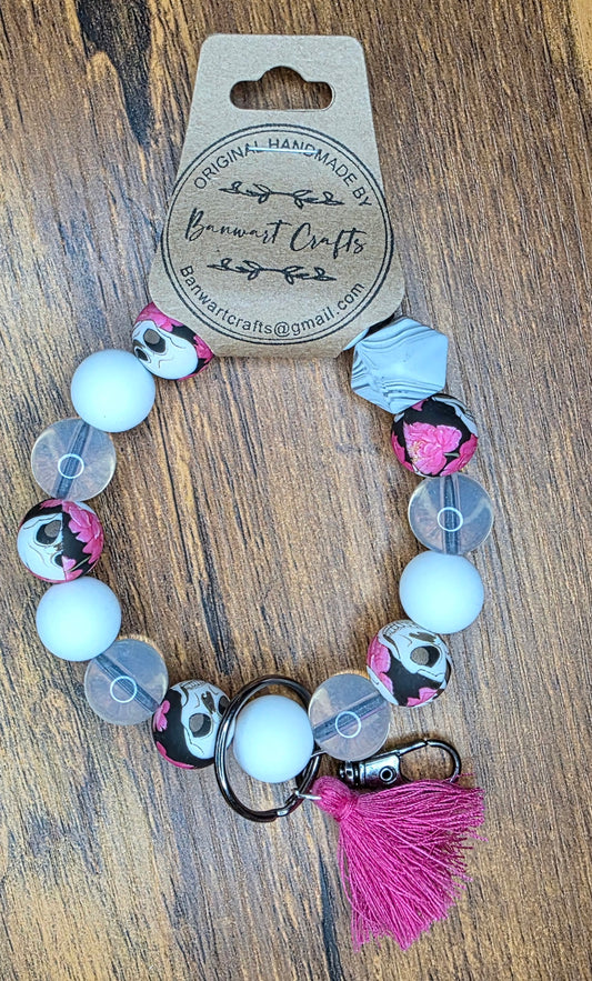 Pink skull, white & clear wristlet